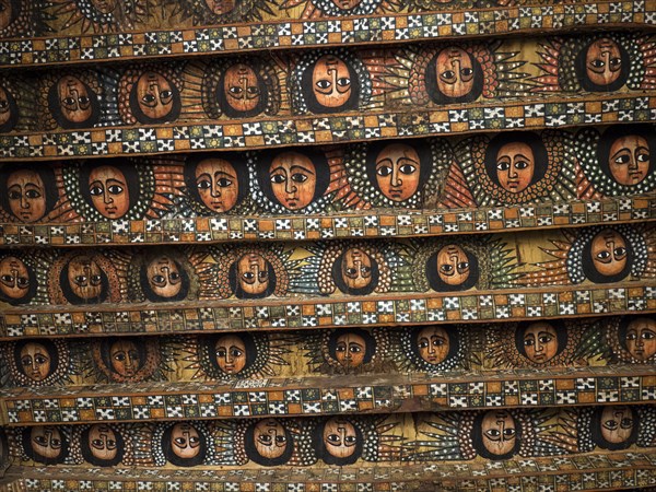 Ceiling painted with faces