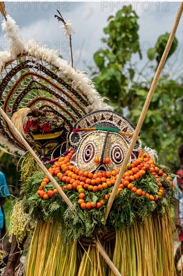 Dancer in full body mask