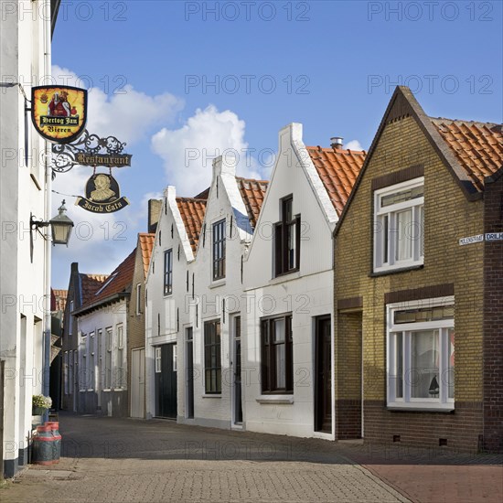 Traditional houses in street at Brouwershaven