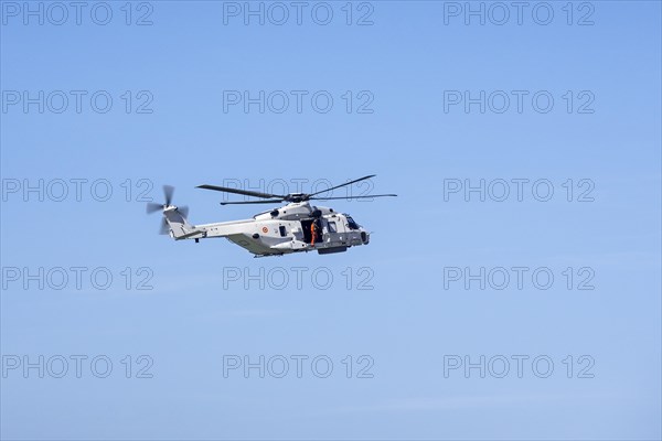 NH90-NFH Caiman NATO Frigate Helicopter of the Belgian Army Air Component in flight during coastal search and rescue mission