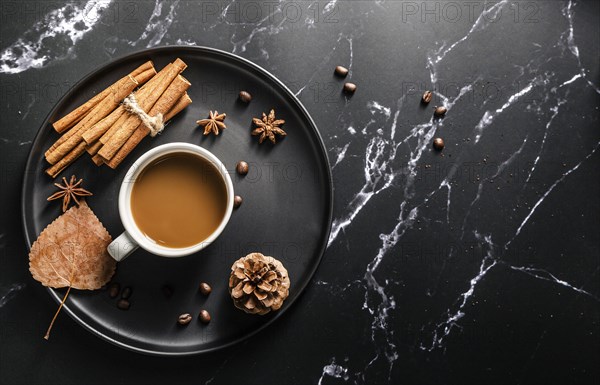 Top view tray with cup coffee cinnamon sticks