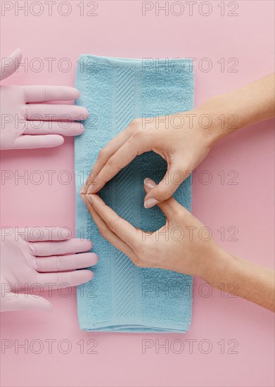 Close up hands blue towel
