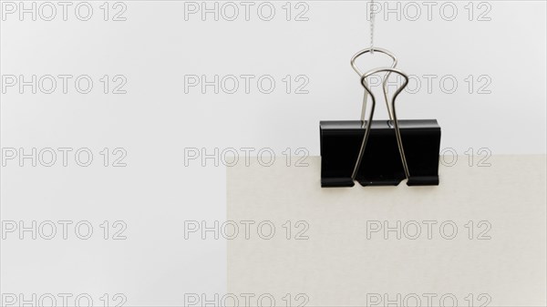 Close up black paper clip with copy space