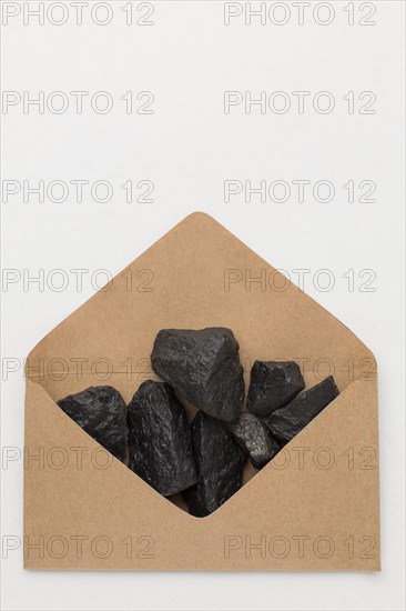 Top view envelope filled with coal ore