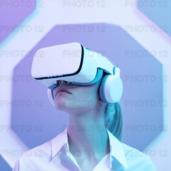 Woman wearing virtual reality simulator