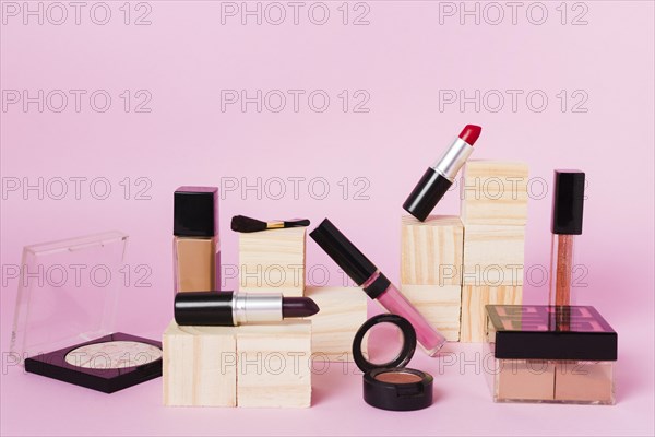 Professional makeup tools colored background