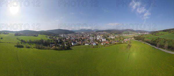 Drone shot over the Kremesberg to the town