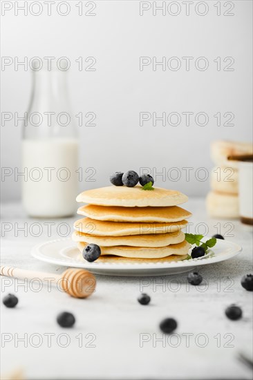 Front view collection pancakes with blueberry
