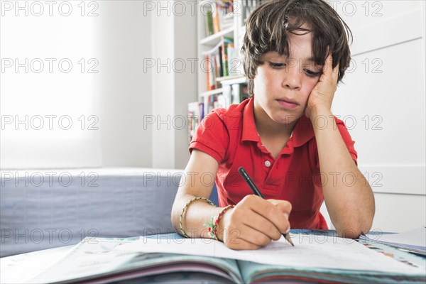 Child drawing paper table