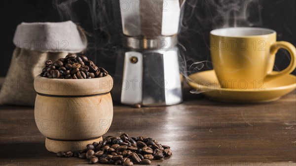 Coffee beans pot near coffee set sack coffee maker