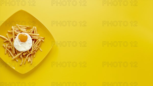 Flat lay frame with egg fries plate