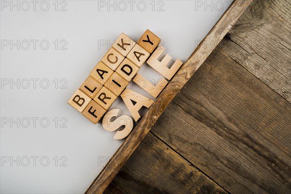 Black friday cubes plain wooden background