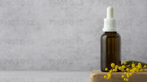 Serum bottle plant with copy space