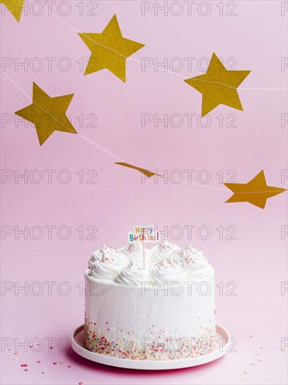 Delicious birthday cake golden stars