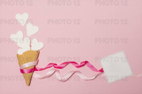 Paper hearts waffle canes near post card