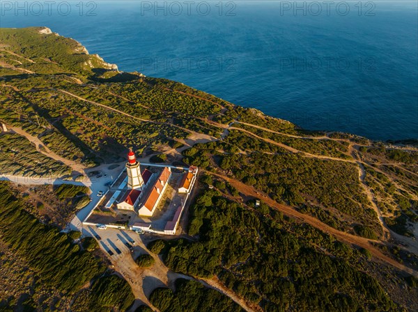 Aerial drone view of lighthouse on Cabo Espichel cape Espichel on Atlantic ocean