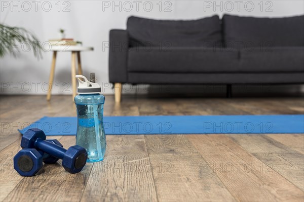 Room with weights water bottle