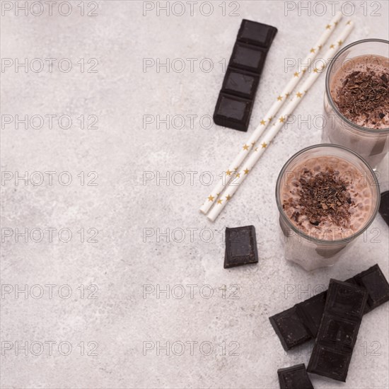 High angle milkshake glasses with chocolate