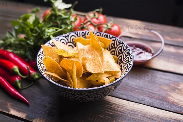 Flat lay nachos vegetables ketchup