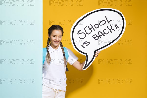 Portrait schoolgirl with speech bubble