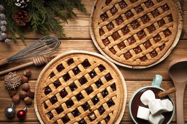 Top view christmas pie with hot chocolate