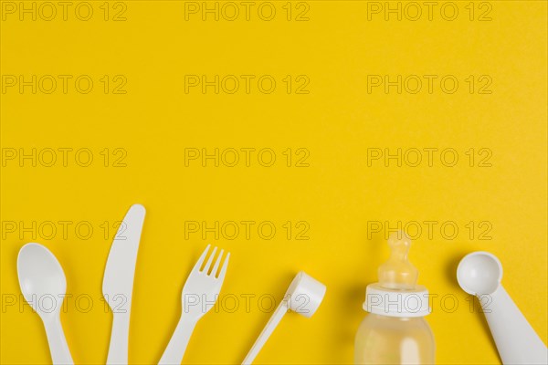 Top view plastic cutlery baby bottle baby shower