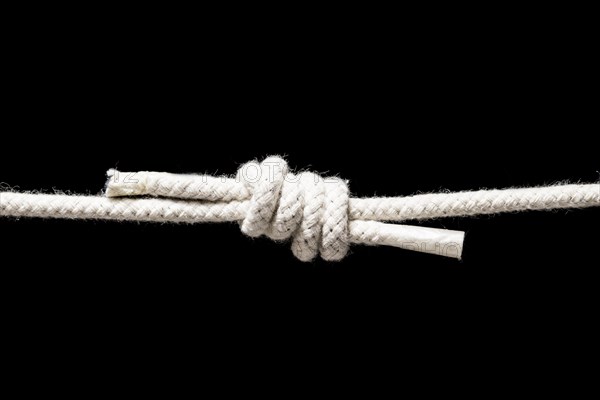 Twine strong white rope isolated black background