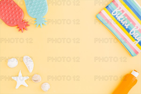 Set summer beach holiday accessories yellow background