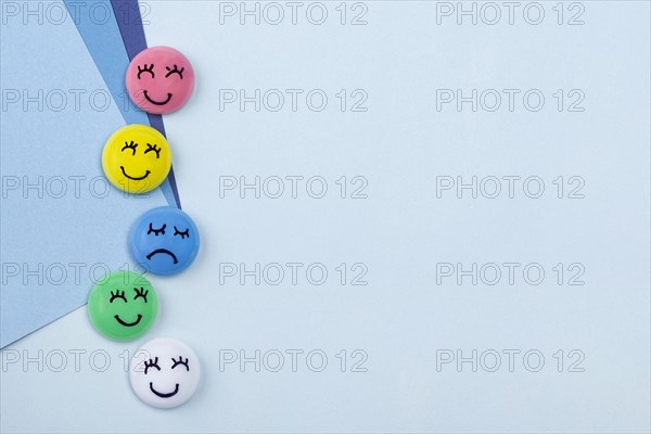 Top view smiley sad faces blue monday with copy space
