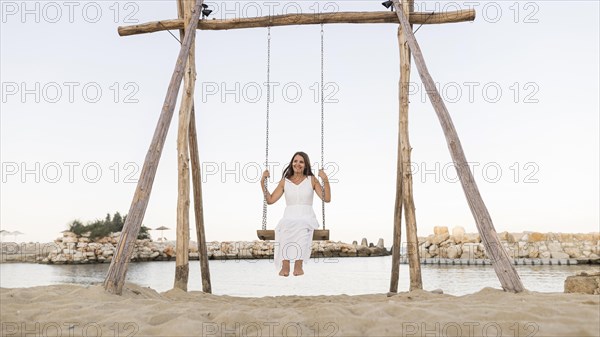 Full shot woman swing