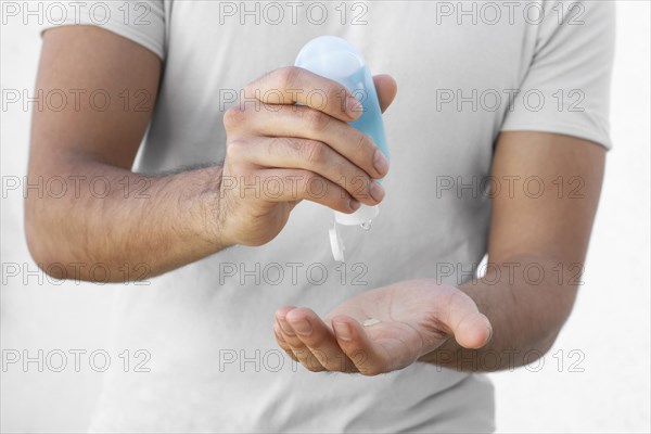 Man using hydroalcoholic gel
