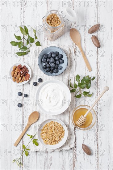 Top view breakfast bowls with fruits table