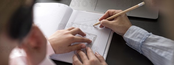 Woman girl taking notes
