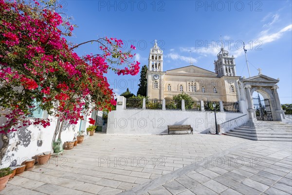 Church of Agia Triada with red bougainvillea