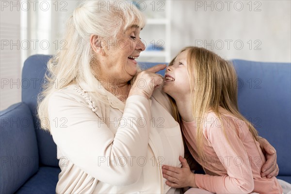 Playful grandma with girl