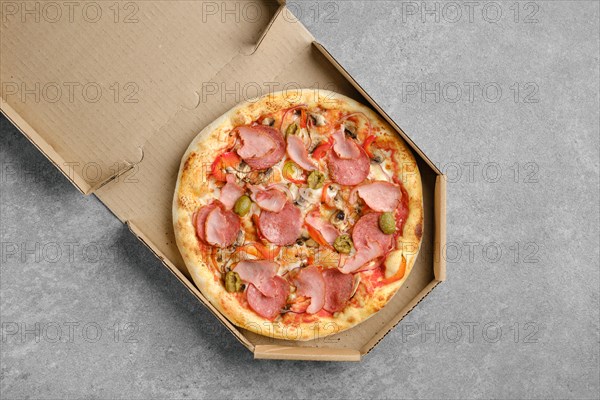 Top view of pizza with ham