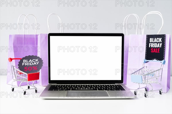 Front view laptop with shopping carts mock up