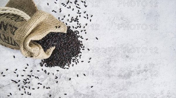 Composition scattered black rice sack
