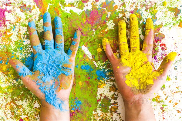 Hands blue yellow colors bright dry colours