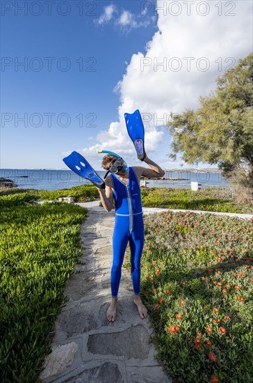 Young man with diving goggles