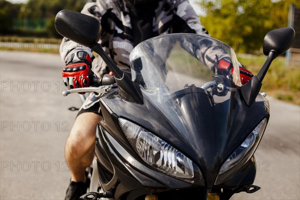 Front view motorbike with biker