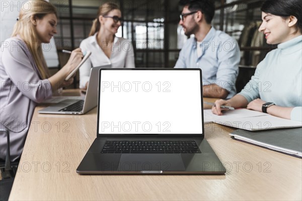 Professional businesswoman with glasses during meeting with laptop