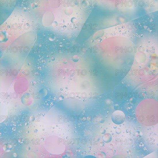 Water drops blue pink background