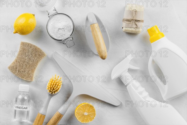 Flat lay cleaning products with lemon baking soda