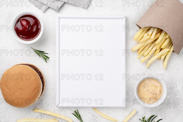 Delicious hamburger fries table