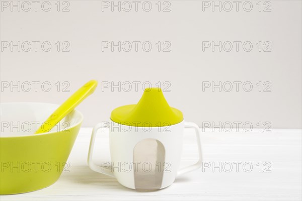 High angle bowl baby bottle with copy space