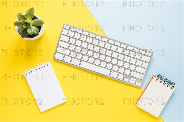 Cozy workplace with keypad notebooks