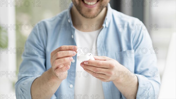 Close up man with airpods