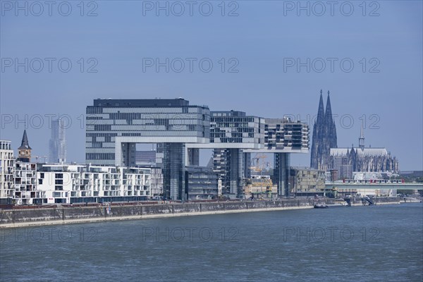 City view of the Rheinauhafen in Cologne with the 3 crane houses