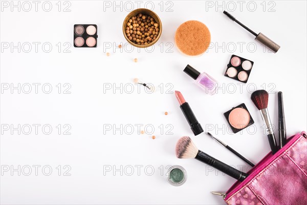 Different makeup cosmetics brushes white background